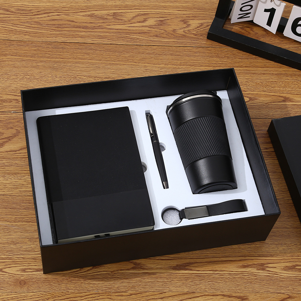 custom corporate gift with your logo – premium notebooks, pens & leather keychains